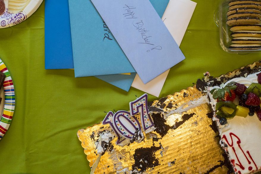 Since Ross's 101st birthday, Dr. Roland Fleck has made sure he and his guests have cake. ( Ryan Dorgan/Jackson Hole News & Guide via AP)