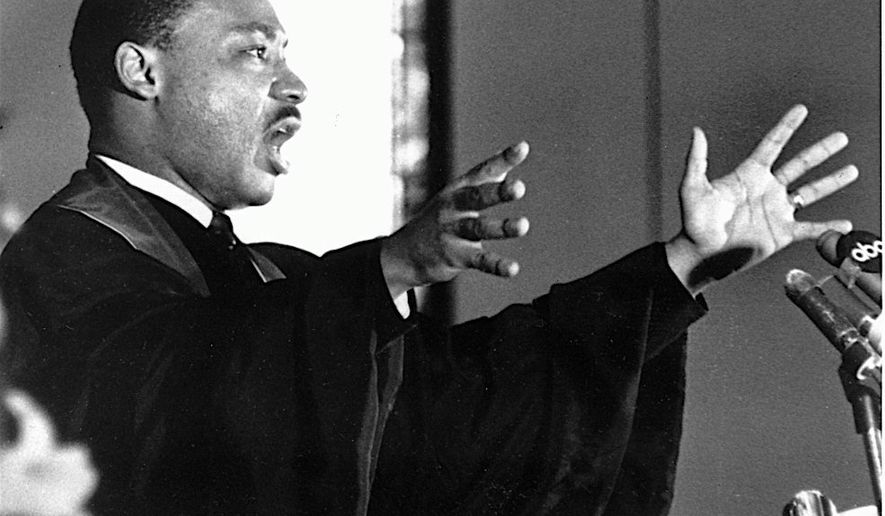 One writer has criticized the fact that much coverage of Dr. Martin Luther King Jr. often omits the late reverend&#x27;s religious convictions. (Associated Press)