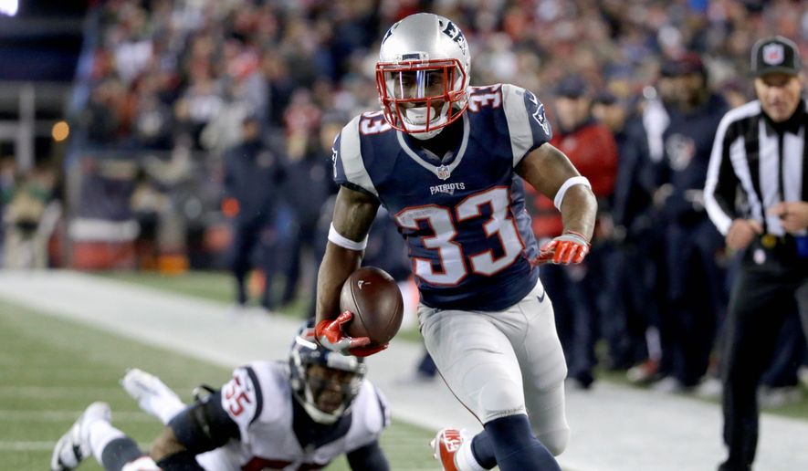 New England Patriots running back Dion Lewis had three touchdowns in an AFC playoff victory on Saturday against the Houston Texans. The Patriots will play in the AFC title game for a record sixth straight year and 11th time in 16 seasons. (Associated Press)
