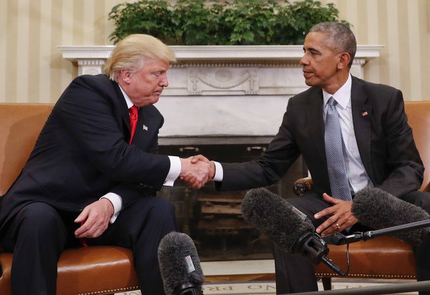 In this Nov. 10, 2016 photo, President Barack Obama and President-elect Donald Trump shake hands following their meeting in the Oval Office of the White House in Washington.   (AP Photo/Pablo Martinez Monsivais)