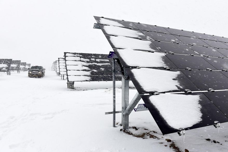 This Tuesday, Jan. 10, 2017 photo, shows the solar farm at St. John's University in Collegeville, Minn. With the newest expansion, the farm now covers 23 acres and can power about 525 homes. (Jason Wachter/St. Cloud Times via AP)