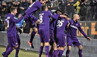 Fiorentina&#39; s Federico Chiesa, second from right, celebrates after scoring his side second goal during the serie A soccer match between Fiorentina and Juventus at the Artemio Franchi stadium in Florence, Italy, Sunday Jan. 15,  2017. (Maurizio Degli Innocenti/ANSA via AP)