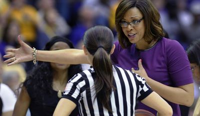 LSU head coach Nikki Caldwell questions a call on a play in the first half of an NCAA college basketball game against South Carolina, Sunday, Jan. 15, 2017, in Baton Rouge, La. (AP Photo/Bill Feig)