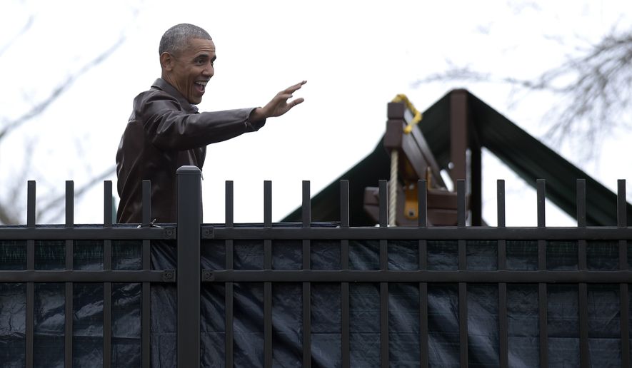 President Barack Obama waves to people in the community during a visit to the Jobs Have Priority Naylor Road Family Shelter in Washington, Monday, Jan. 16, 2017. (AP Photo/Susan Walsh)