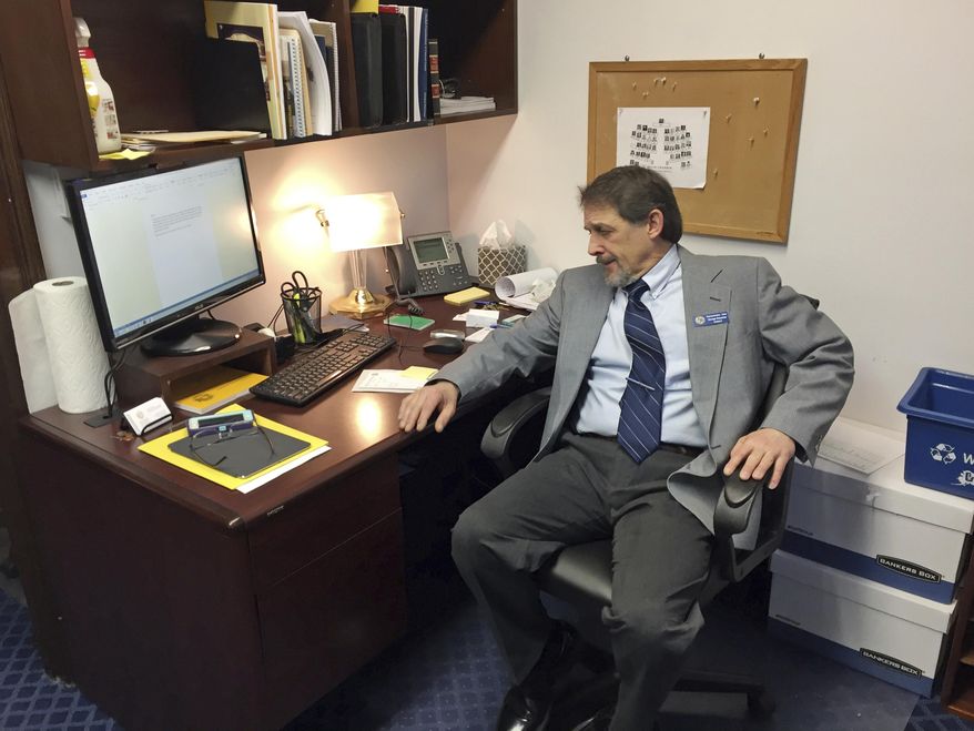 Republican Representative-elect George Rauscher sits in his office at the Alaska Capitol on Monday, Jan. 16, 2017, in Juneau, Alaska. Rauscher is among the newly elected legislators who will be sworn in Tuesday. Among Alaska's newest legislators, there is optimism and an eagerness to get to work on addressing the state's multibillion-dollar budget deficit. (AP Photo/Becky Bohrer)