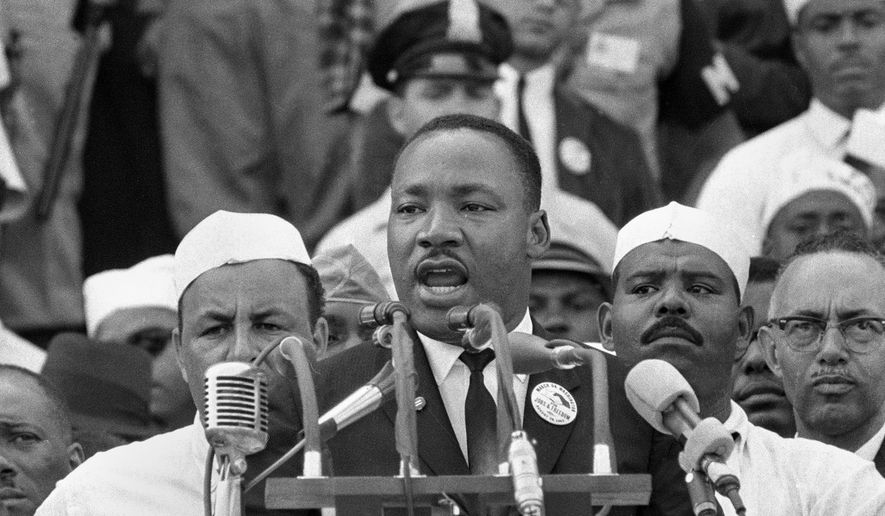 In this Aug. 28, 1963, file photo, Dr. Martin Luther King Jr., head of the Southern Christian Leadership Conference, addresses marchers during his &amp;quot;I Have a Dream&amp;quot; speech at the Lincoln Memorial in Washington. (AP Photo, File)
