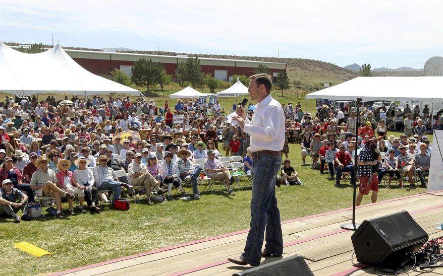 FILE - In this Aug. 15, 2015, file photo, Nevada Attorney General Adam Laxalt gives the welcoming remarks at the Inaugural Basque Fry at the Inaugural Basque Fry at Corley Ranch in Gardnerville, Nev. Laxalt, one of the leading Nevada Republicans considering running for governor next year, is showing off a sizable campaign war chest nearly two years before the 2018 election. (AP Photo/Lance Iversen, File)