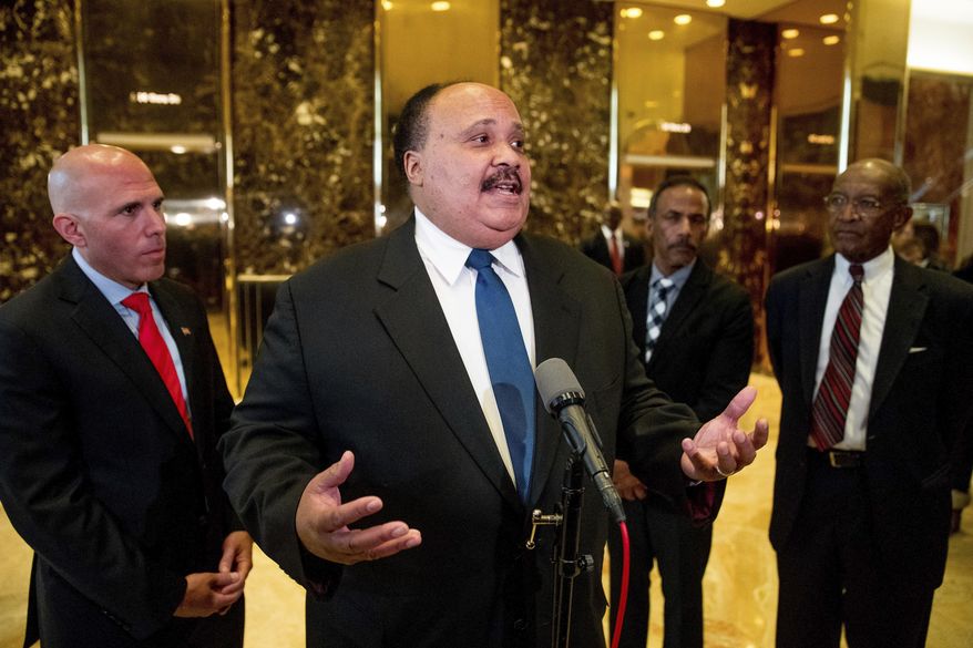 Martin Luther King III, son of Martin Luther King Jr. speaks to members of the media following a meeting with President-elect Donald Trump at Trump Tower in New York, Monday, Jan. 16, 2017. (AP Photo/Andrew Harnik)