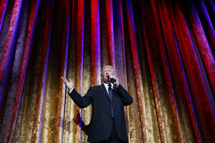 President-elect Donald Trump speaks during the presidential inaugural Chairman's Global Dinner, Tuesday, Jan. 17, 2017, in Washington. (AP Photo/Evan Vucci)