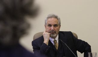 Senate President Pete Kelly, R-Fairbanks, right, listens to a reporter&#39;s questions during a news conference discussing the Senate Majority&#39;s budget priorities ahead of the start of the Alaska legislative session Tuesday, Jan. 17, 2017, in Juneau, Alaska. The state&#39;s multibillion dollar budget deficit is expected to dominate this year&#39;s session. (AP Photo/Mark Thiessen)