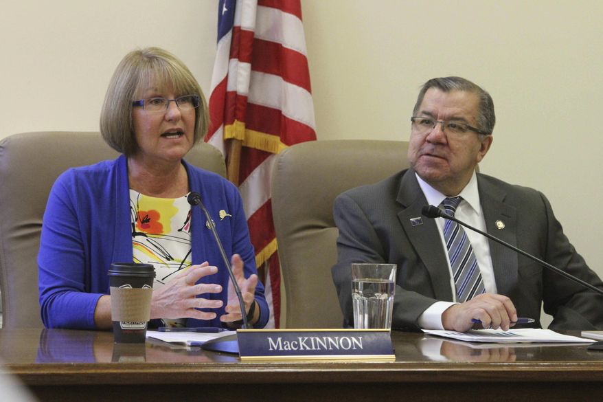 State State Sens. Anna MacKinnon, R-Eagle River, left, and Lyman Hoffman, D-Bethel, discuss the Senate Majority's budget priorities ahead of the start of the Alaska legislative session Tuesday, Jan. 17, 2017, in Juneau, Alaska. The state's multibillion dollar budget deficit is expected to dominate this year's session. (AP Photo/Mark Thiessen)