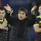 Chelsea manager Antonio Conte celebrates towards fans after the English Premier League soccer match between Leicester City and Chelsea at the King Power Stadium in Leicester, England, Saturday, Jan. 14, 2017. (AP Photo/Rui Vieira)