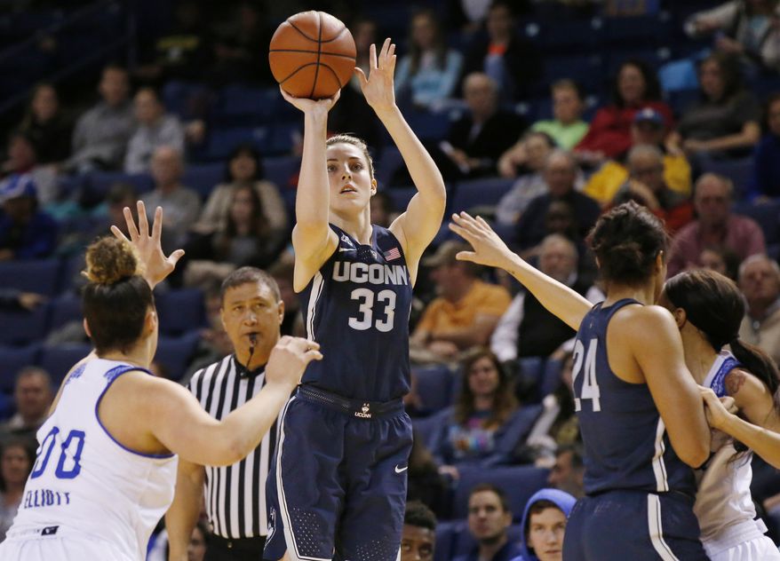 Connecticut's Katie Lou Samuelson (33) shoots in front of Tulsa forward Kendrian Elliott (00), UConn's Napheesa Collier (24) and Tulsa's Ebony Parker, right, during the first quarter of an NCAA basketball game in Tulsa, Okla., Tuesday, Jan. 17, 2017. (AP Photo/Sue Ogrocki)