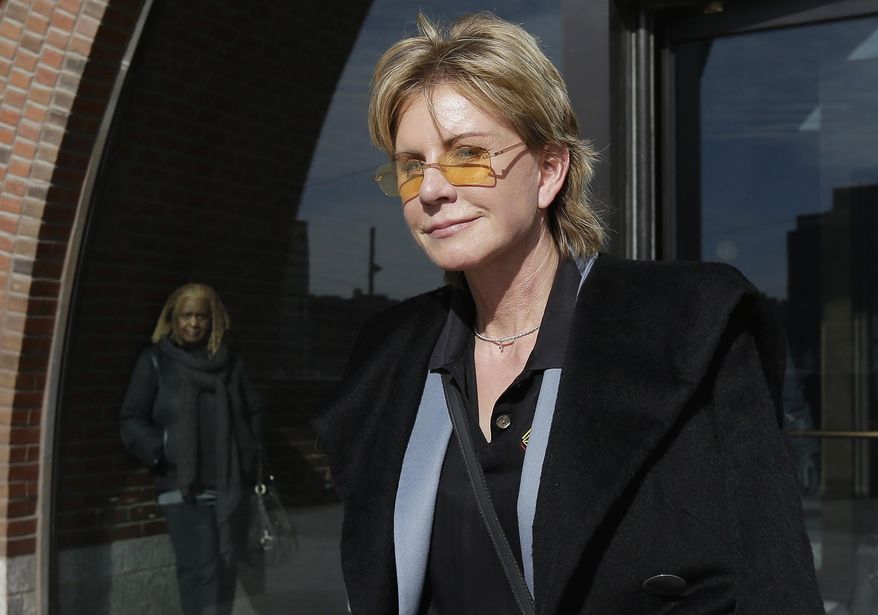 FILE - In a Thursday, Feb. 7, 2013 file photo, author Patricia Cornwell leaves federal court in Boston, after she took the stand in her lawsuit against her former financial management company. Cornwell settled a lawsuit Tuesday, Jan. 17, 2017, against her former business managers, avoiding a second trial for a case that dates to 2009. The author had claimed the New York accounting firm Anchin, Block & Anchin LLP was negligent in handling her finances and cost her millions in losses or unaccounted for revenue. (AP Photo/Steven Senne, File)