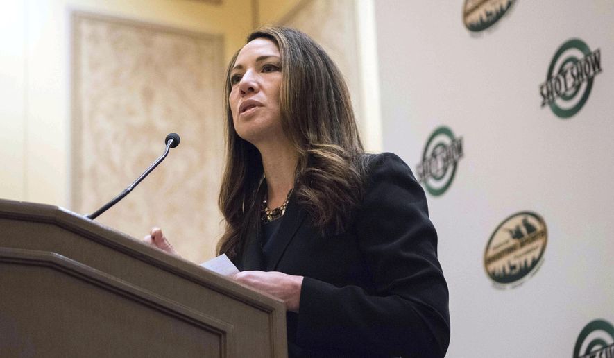 Dr. Christine Moutier, medical director for the American Foundation for Suicide Prevention, discusses an initiative with the National Shooting Sports Foundation to prevent suicide, Tuesday, Jan. 17, 2017, in Las Vegas. It’s a difficult topic to discuss and an even tougher one to fix, fraught with politics and societal stigmas: people who kill themselves with a gun. But now two unlikely allies, the gun industry and a leading suicide prevention group, are coming together to tackle it. (AP Photo/Lisa Marie Pane)