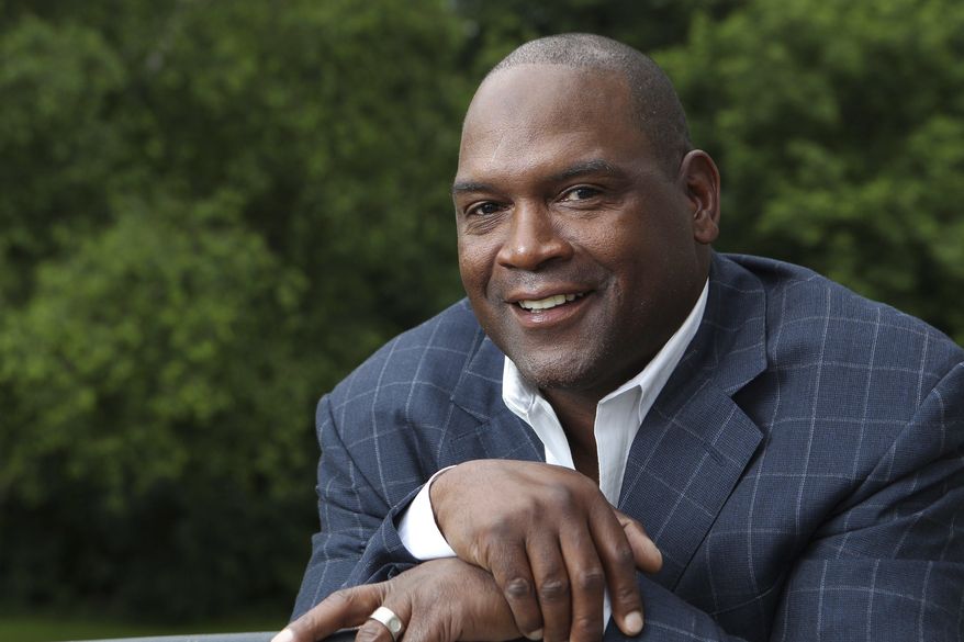 FILE - In this June 29, 2013, file photo, former Montreal Expos player Tim Raines poses for a photograph prior to the induction ceremony for the Canadian Baseball Hall of Fame in St. Mary's, Ontario. Raines and Jeff Bagwell are likely to be voted into baseball's Hall of Fame on Wednesday, Jan. 18, 2017, when Trevor Hoffman and Ivan Rodriguez also could gain the honor. (Dave Chidley/The Canadian Press via AP, File)