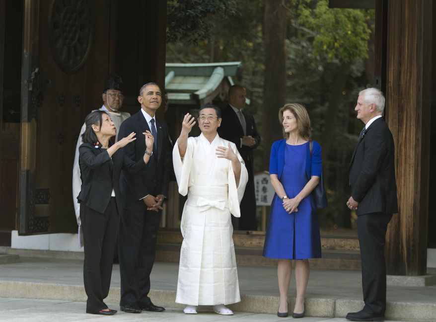 FILE - In this April 24, 2014, file photo, attended by U.S. Ambassador to Japan Caroline Kennedy and her husband Edwin Schlossberg, right, President Barack Obama tours Meiji Shrine in Tokyo. Kennedy is stepping down Wednesday, Jan. 18, 2017 after three years as U.S. ambassador to Japan, where she was welcomed like a celebrity and worked to deepen the U.S.-Japan relationship despite regular flare-ups over American military bases on the southern island of Okinawa. (AP Photo/Carolyn Kaster, File)