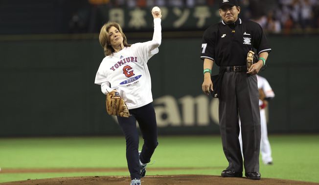 FILE - In this March 28, 2014, file photo, U.S. Ambassador to Japan Caroline Kennedy throws out the ceremonial first pitch before the Japan&#x27;s Central League professional baseball opening game between the Yomiuri Giants and the Hanshin Tigers at Tokyo Dome in Tokyo. Kennedy is stepping down Wednesday, Jan. 18, 2017 after three years as U.S. ambassador to Japan, where she was welcomed like a celebrity and worked to deepen the U.S.-Japan relationship despite regular flare-ups over American military bases on the southern island of Okinawa. (AP Photo/Eugene Hoshiko, File)