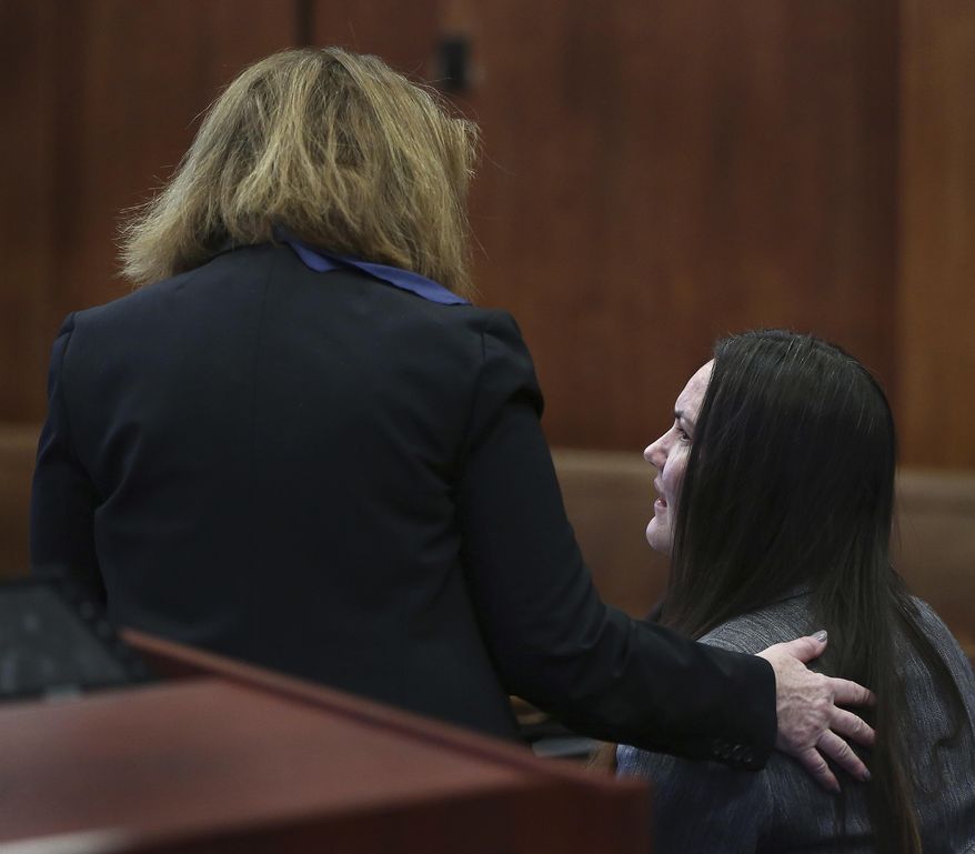 Rachelle Bond appears in Suffolk Superior Court with her defense attorney Janice Bassil, left. for pre-trial motions, before Judge Christine Roach, Tuesday, Jan. 17, 2017, in Boston. Bond is accused of helping dispose of her 2-year-old daughter's body after her boyfriend allegedly killed the girl in 2015. (Pat Greenhouse/The Boston Globe via AP, Pool)