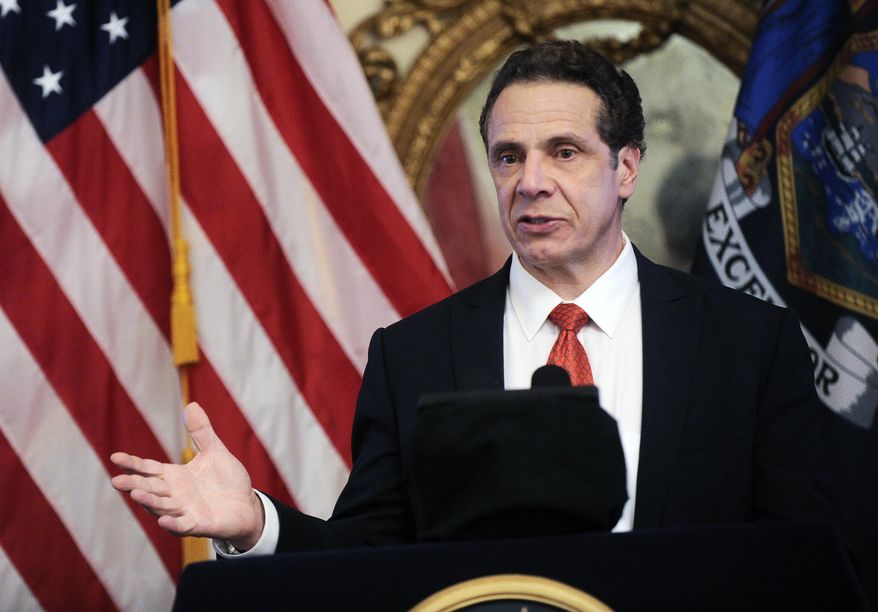 New York Gov. Andrew Cuomo releases his proposed state budget during a news conference at the Executive Mansion in Albany, N.Y., Tuesday, Jan. 17, 2017. Cuomo said his latest state budget proposal aims to help the middle class by making college more affordable, reducing taxes and helping families pay for child care. (AP Photo/Hans Pennink)