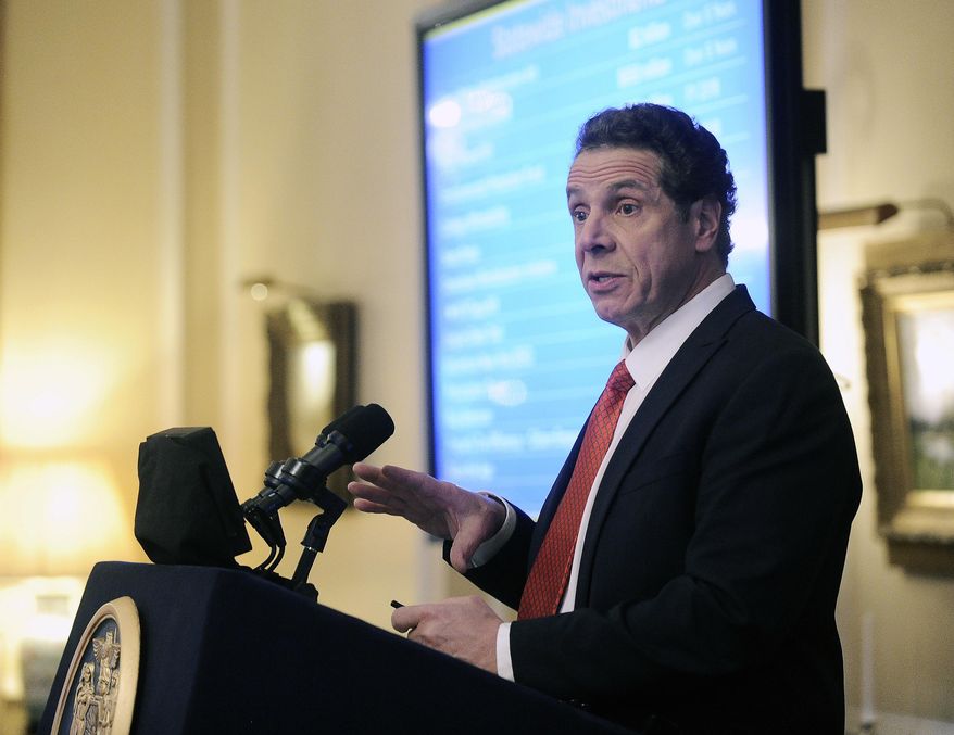 New York Gov. Andrew Cuomo releases his proposed state budget during a news conference at the Executive Mansion in Albany, N.Y., Tuesday Jan. 17, 2017. Cuomo said his latest state budget proposal aims to help the middle class by making college more affordable, reducing taxes and helping families pay for child care. (AP Photo/Hans Pennink)