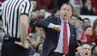 North Carolina State&#x27;s head coach Mark Gottfried doesn&#x27;t like the call by the official during the first half of an NCAA college basketball game against Pittsburgh in Raleigh, N.C., Tuesday, Jan. 17, 2017. (Ethan Hyman/The News &amp;amp; Observer via AP)