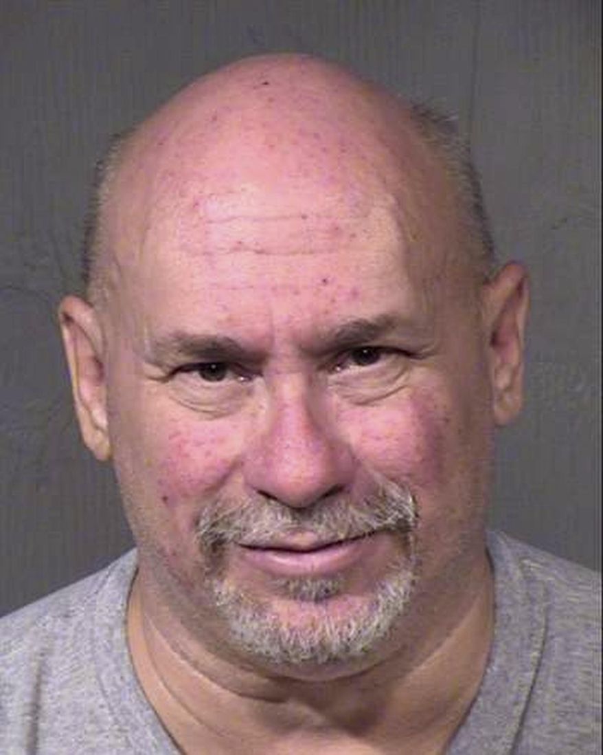 This undated booking photo provided by the Maricopa County Sheriff shows William James Hartwell, who is scheduled to go on trial next week on charges that his pornography-production studio near Phoenix's airport operated as a front for a prostitution ring. Hartwell denies the allegations and accuses the government of criminalizing actions protected by the First Amendment. Prosecutors say Hartwell's actions aren't constitutionally protected. (Maricopa County Sheriff via AP)