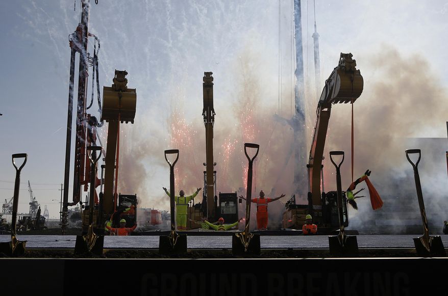 A performance group poses during a ground breaking ceremony for the Golden State Warriors' new arena, the Chase Center, in San Francisco, Tuesday, Jan. 17, 2017. (AP Photo/Jeff Chiu)