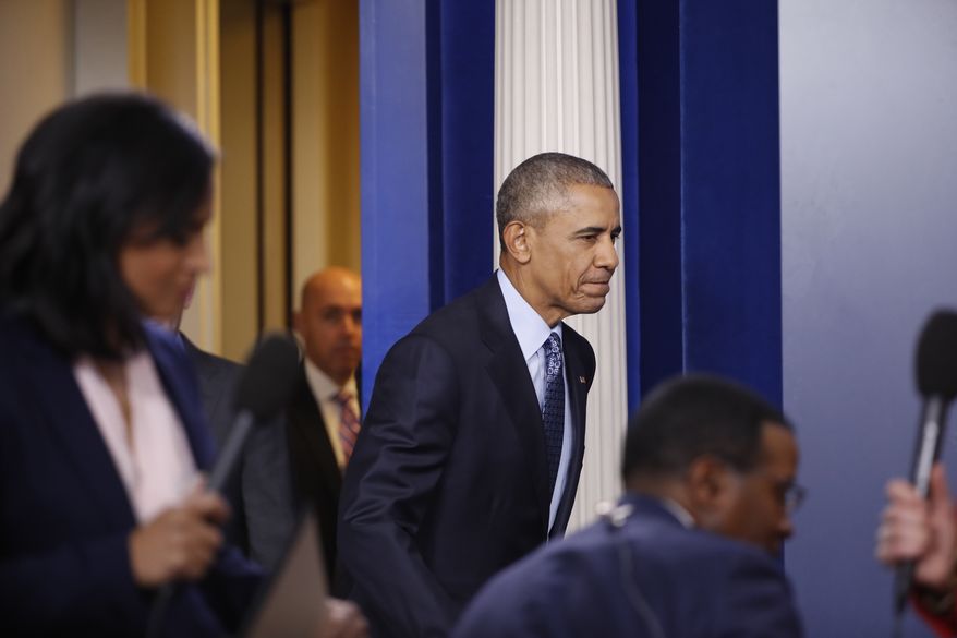 President Barack Obama arrives for his final presidential news conference, Wednesday, Jan. 18, 2017, in the briefing room of the White House in Washington. (AP Photo/Carolyn Kaster)