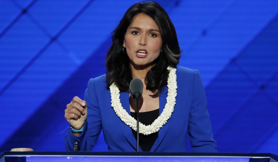 FILE - In this July 26, 2016 file photo, Rep. Tulsi Gabbard, D-Hawaii speaks at the Democratic National Convention in Philadelphia. Gabbard has made an unannounced trip to Syria and Lebanon, traveling to the region two months after she sat down with President-elect Donald Trump to discuss foreign policy.  (AP Photo/J. Scott Applewhite, File)