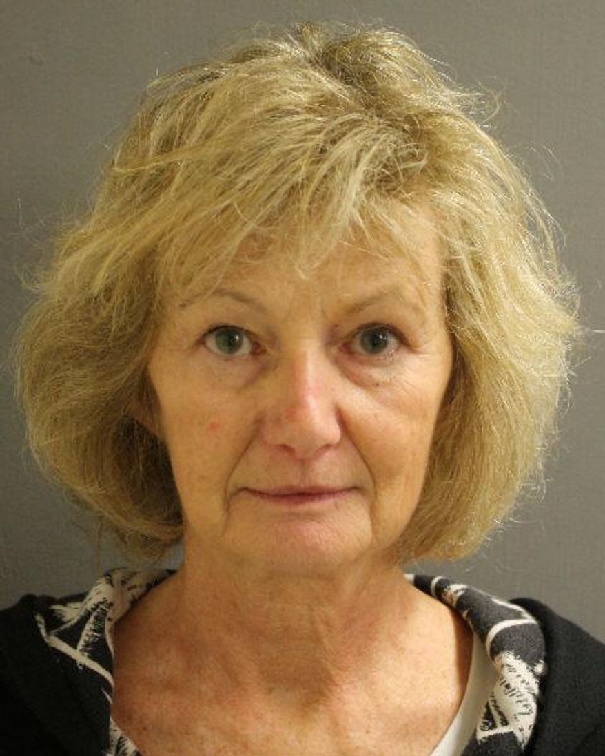 CORRECTS FROM LEINA TO LIANA- This booking photo released by the Harris County (Texas) Sheriff’s Office shows Elaine Yates. Two sisters who disappeared from Rhode Island with their mother Elaine Yates in 1985 have been located in the Houston area, and their mother was charged with snatching them, police announced Tuesday, Jan. 17, 2017. Yates, who had been living in Houston under the name Liana Waldberg, was arrested on Monday, Jan. 16, without incident and faces arraignment Wednesday in Rhode Island on a fugitive charge. (Harris County Sheriff’s Office via AP)