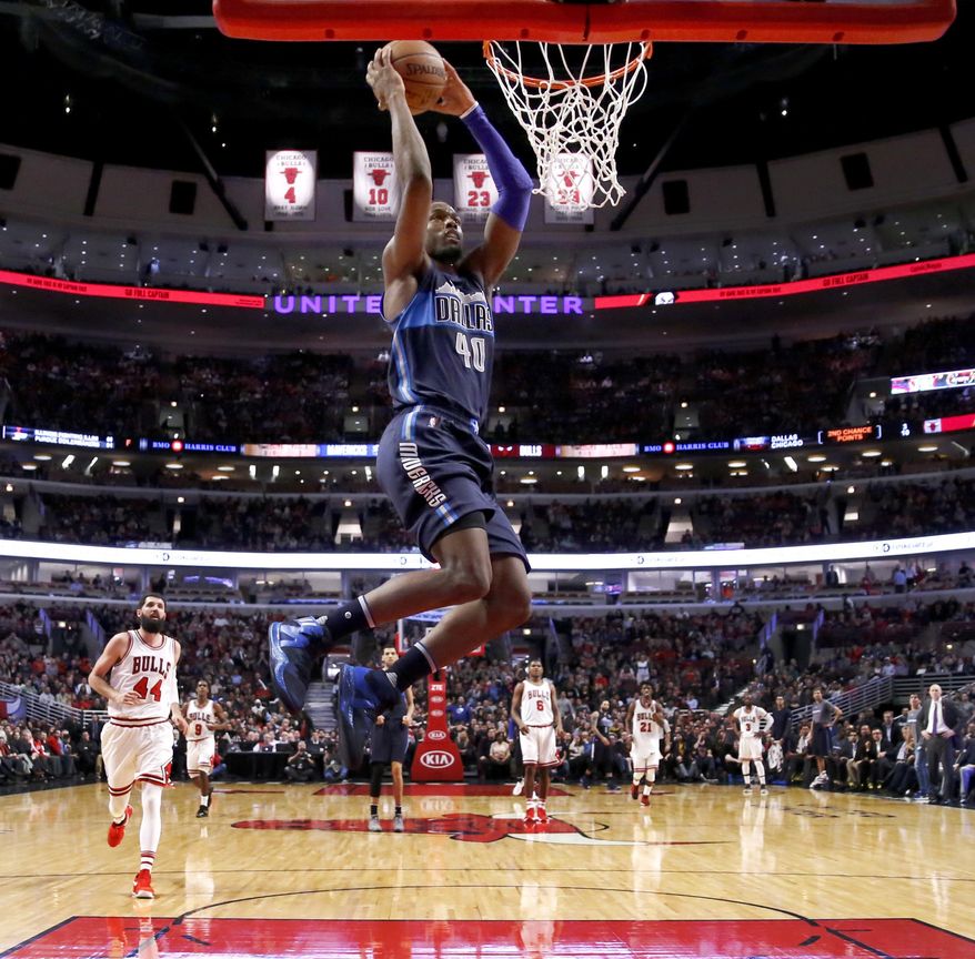 Dallas Mavericks' Harrison Barnes dunks the ball during the second half of an NBA basketball game against the Chicago Bulls, Tuesday, Jan. 17, 2017, in Chicago. The Mavericks won 99-98. (AP Photo/Charles Rex Arbogast)