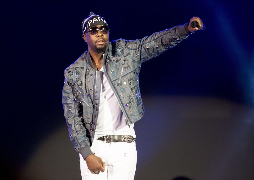 FILE - In this Saturday, Aug. 15, 2015, file photo, Wyclef Jean performs for athletes during the closing ceremony of the Parapan Am Games in Toronto. Kelly Ripa, singer Wyclef Jean and soccer pro Carli Lloyd are among the 15 newest members of the New Jersey Hall of Fame, the group announced Tuesday, Jan. 17, 2017. (Darren Calabrese/The Canadian Press via AP, File)