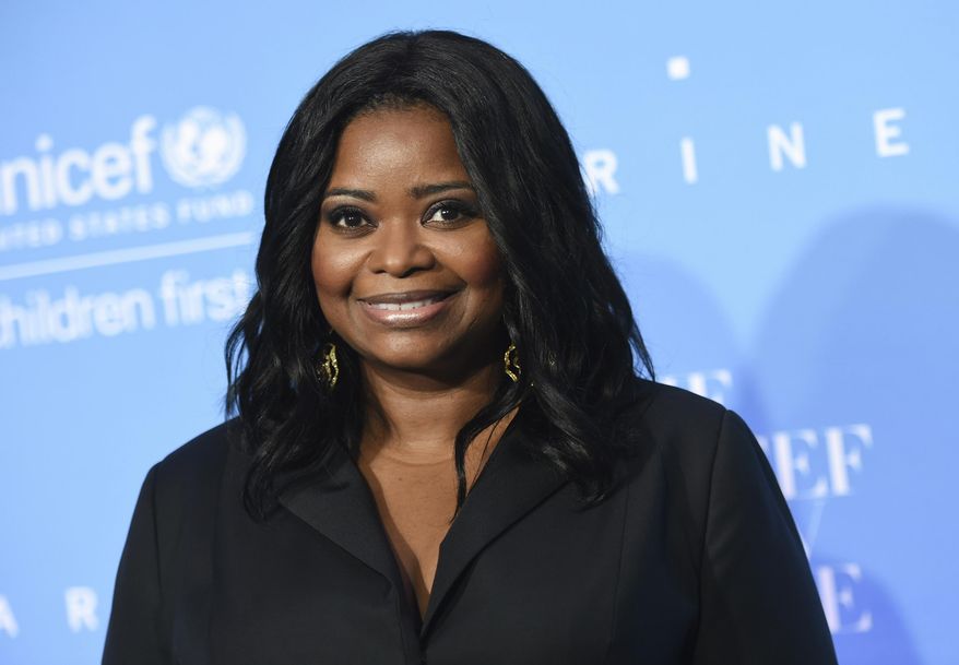 FILE - This Nov. 29, 2016 file photo shows Octavia Spencer at the 12th Annual UNICEF Snowflake Ball in New York. Spencer has been named Woman of the Year by Harvard University’s Hasty Pudding Theatricals. She is scheduled to be honored with a parade through the streets of Cambridge on Jan. 26, followed by a roast and the presentation of her pudding pot. (Photo by Evan Agostini/Invision/AP, File)