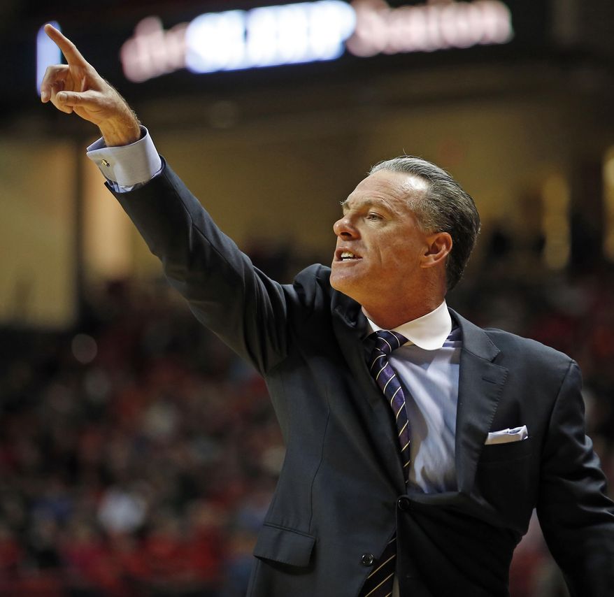 TCU coach Jamie Dixon directs his players during an NCAA college basketball game against Texas Tech, on Wednesday, Jan. 18, 2017, in Lubbock, Texas. (Brad Tollefson/Lubbock Avalanche-Journal via AP)