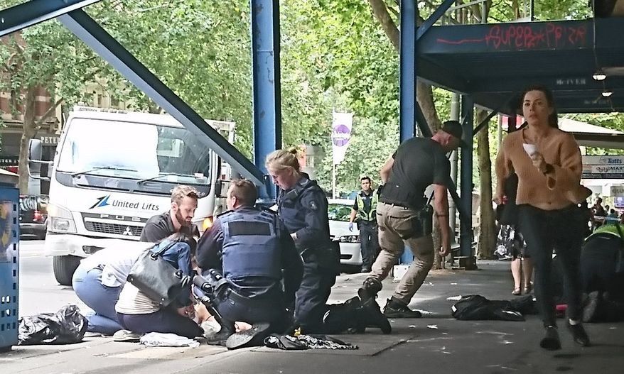 Police and emergency services at the scene after a car hit pedestrians in Bourke Street Mall in Melbourne on Friday. (AAP)