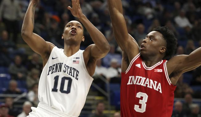 Penn State&#x27;s Tony carr (10) goes to the basket as Indiana&#x27;s Og Anunoby (3) defends during the first half of an NCAA college basketball game in State College, Pa., Wednesday, Jan. 18, 2017. (AP Photo/Chris Knight)