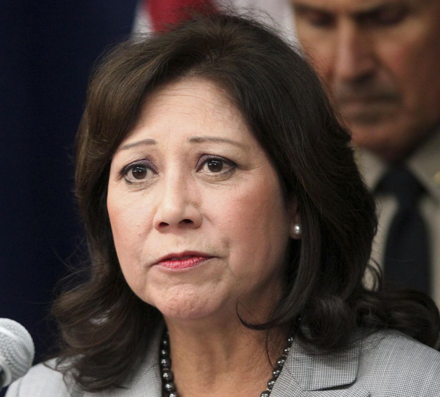 FILE - In this Nov. 16, 2012, file photo, Labor Secretary Hilda Solis speaks in Los Angeles. President-elect Donald Trump's decision not to appoint any Latinos to his cabinet is drawing fierce criticism from Hispanics. The move means no Latino will serve in a presidential cabinet for the first time in nearly 30 years and comes at a time when Hispanics are now the largest minority group in the country. (AP Photo/Richard Vogel, File)