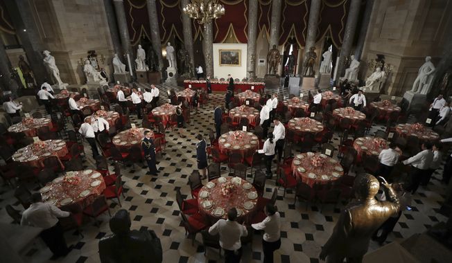 Statuary Hall in the Capitol is set for a luncheon with the newly sworn in president and vice president, Friday, Jan. 20, 2017 in Washington. President-elect Donald Trump will become the 45th United States president when he&#x27;s sworn in today. (AP Photo/Manuel Balce Ceneta)