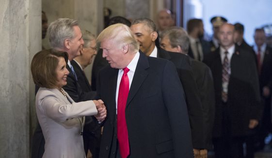President-elect Donald Trump greets House Minority Leader Nancy Pelosi of Calif., and other Congressional leaders as he arrives for his inauguration ceremony on Capitol Hill in Washington, Friday, Jan. 20, 2017. (AP Photo/J. Scott Applewhite, Pool) ** FILE **
