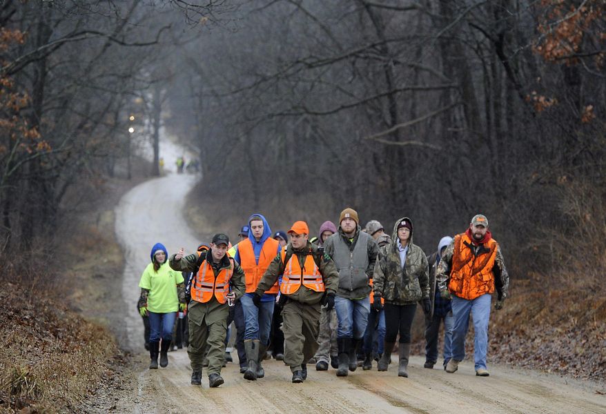 CORRECTS SPELLING OF LAST NAME TO LYON, NOT LYONS - Volunteers gather to search for Jace Lyon, 9, in a rural area just north of Hillsdale, Mich., Friday, Jan. 20, 2017. Lyon has been missing since Wednesday evening, Jan. 18. (J. Scott Park/Jackson Citizen Patriot via AP)