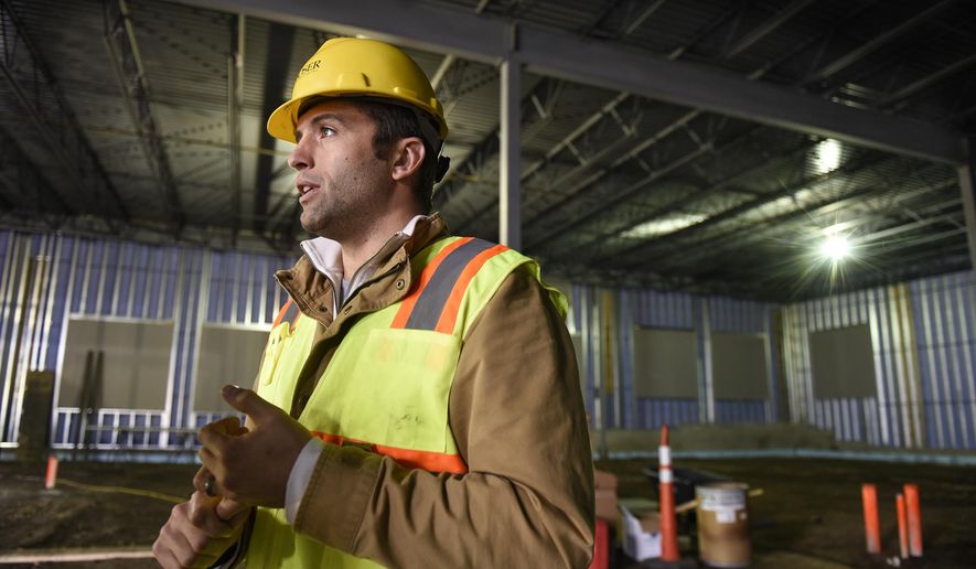 In this Nov. 2, 2016 photo, Boser Construction Inc. sales and operations manager Ryan Cross talks about the many facets of the construction business at a Boser job site in Sauk Rapids, Minn. (Dave Schwarz/The St. Cloud Times via AP) /St. Cloud Times via AP)