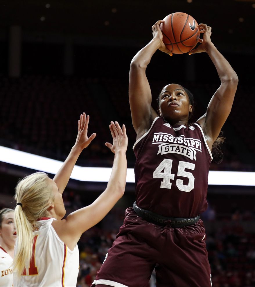 FILE - In this Dec. 3, 2016, file photo, Mississippi State center Chinwe Okorie (45) grabs a rebound over Iowa State guard Jadda Buckley (11) during the first half of an NCAA college basketball game, in Ames, Iowa. Mississippi State's roster hasn't changed much since last season, when the program won 28 games and made the NCAA Tournament's Sweet 16. But the Bulldogs have hit a new level so far this season. (AP Photo/Charlie Neibergall, File)