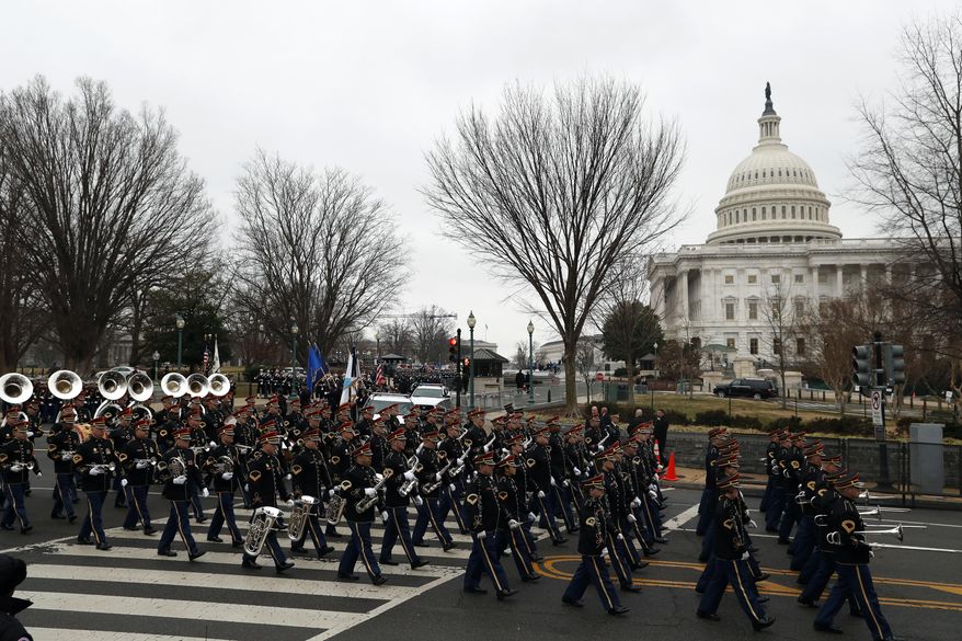 The inaugural parade steps off from the U.S. Capitol as it heads to the White House Friday, Jan. 20, 2017 in Washington. (AP Photo/Alex Brandon)