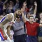 Detroit Pistons forward Marcus Morris and fans react after Morris&#39; game-winning tip=in during the second half of the team&#39;s NBA basketball game against the Washington Wizards, Saturday, Jan. 21, 2017, in Auburn Hills, Mich. Detroit defeated Washington 113-112. (AP Photo/Carlos Osorio)