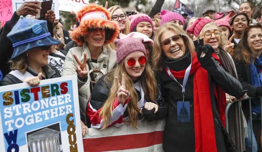 Gloria Steinem, center right, greets protesters at the barricades before speaking at the Women&#x27;s March on Washington during the first full day of Donald Trump&#x27;s presidency, Saturday, Jan. 21, 2017 in Washington.  (AP Photo/John Minchillo)