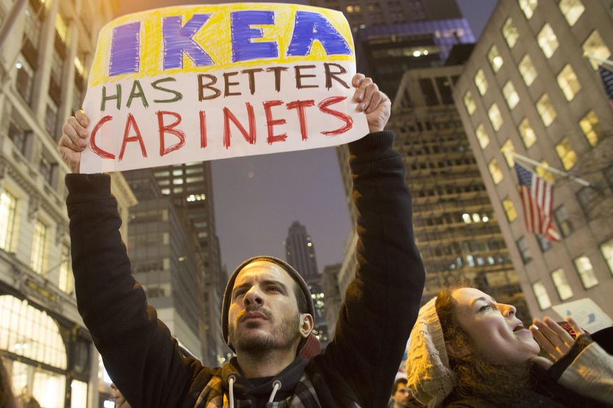 Demonstrators march up Fifth Avenue during a women's march, Saturday, Jan. 21, 2017, in New York. The march is being held in solidarity with similar events taking place in Washington and around the nation. (AP Photo/Mary Altaffer)