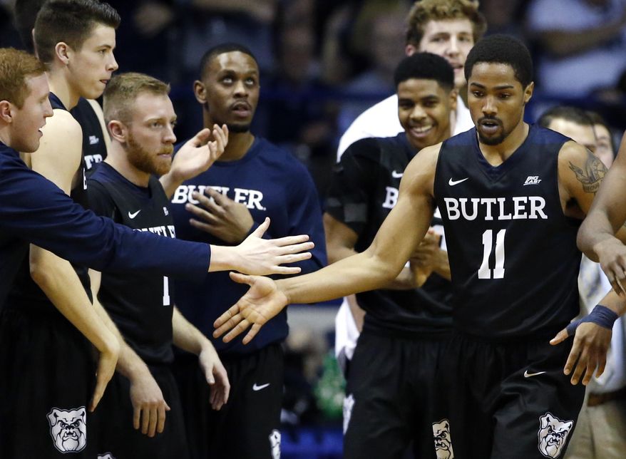 Butler guard Kethan Savage (11) celebrates with teammates after scoring a basket during the overtime of an NCAA college basketball game against DePaul Saturday, Jan. 21, 2017, in Rosemont, Ill. Butler won 70-69 in overtime. (AP Photo/Nam Y. Huh)