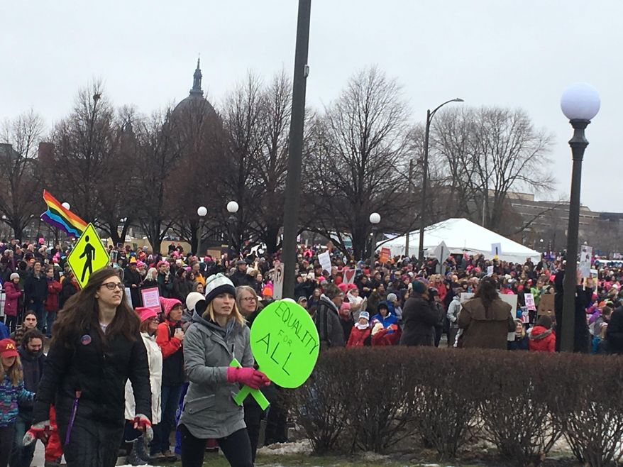 Crowd at Minnesota Women's March in front of the Cathedral of Saint Paul in St. Paul, Minn., on Jan. 21, 2017. (AP Photo/Jeff Badnen)