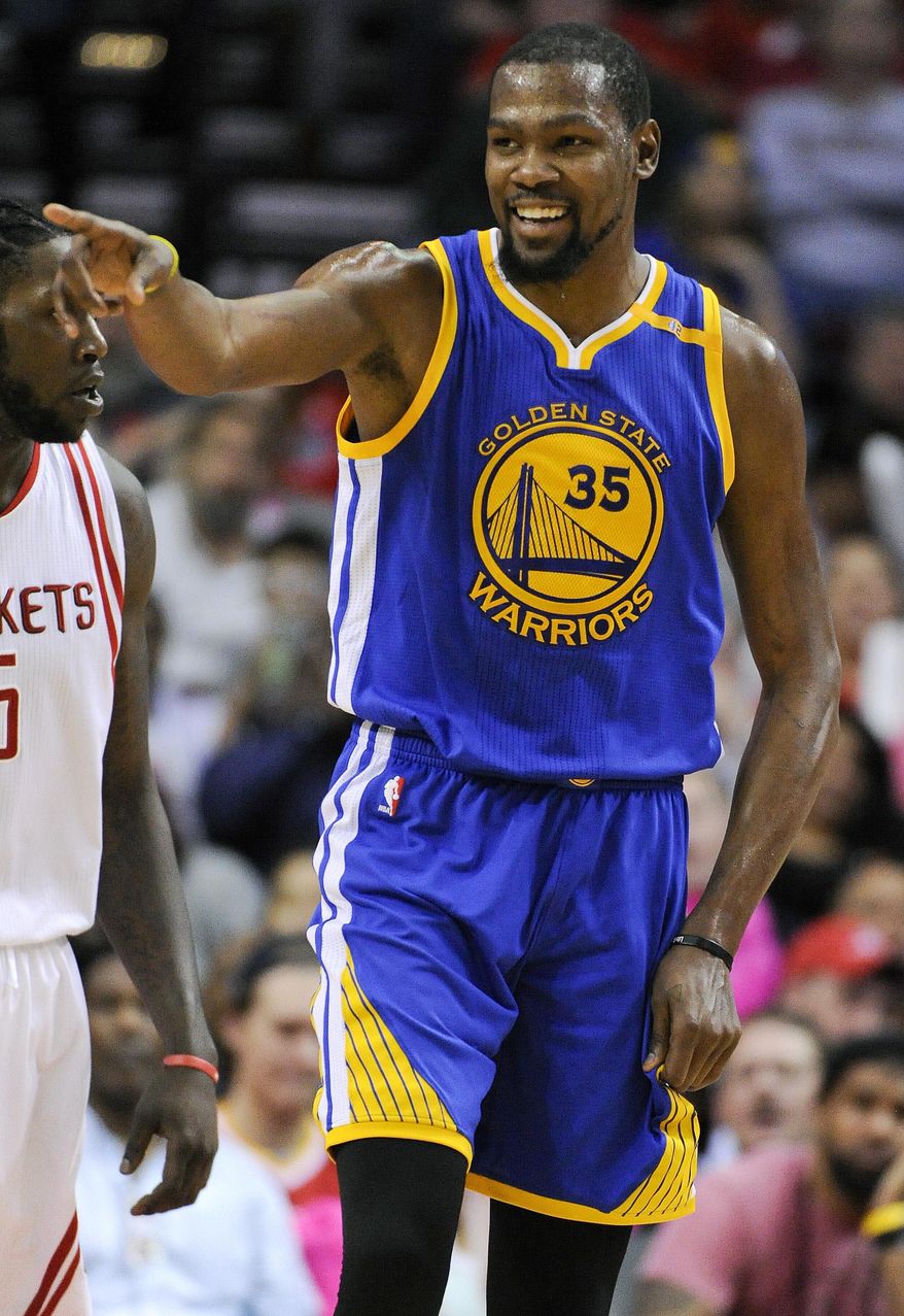 Golden State Warriors forward Kevin Durant reacts after drawing a foul during the second half of the team's NBA basketball game against the Houston Rockets, Friday, Jan. 20, 2017, in Houston. Golden State won 125-108. (AP Photo/Eric Christian Smith)